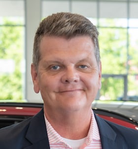 Staff member Dennis Fisher from 2a5e36e49dfb