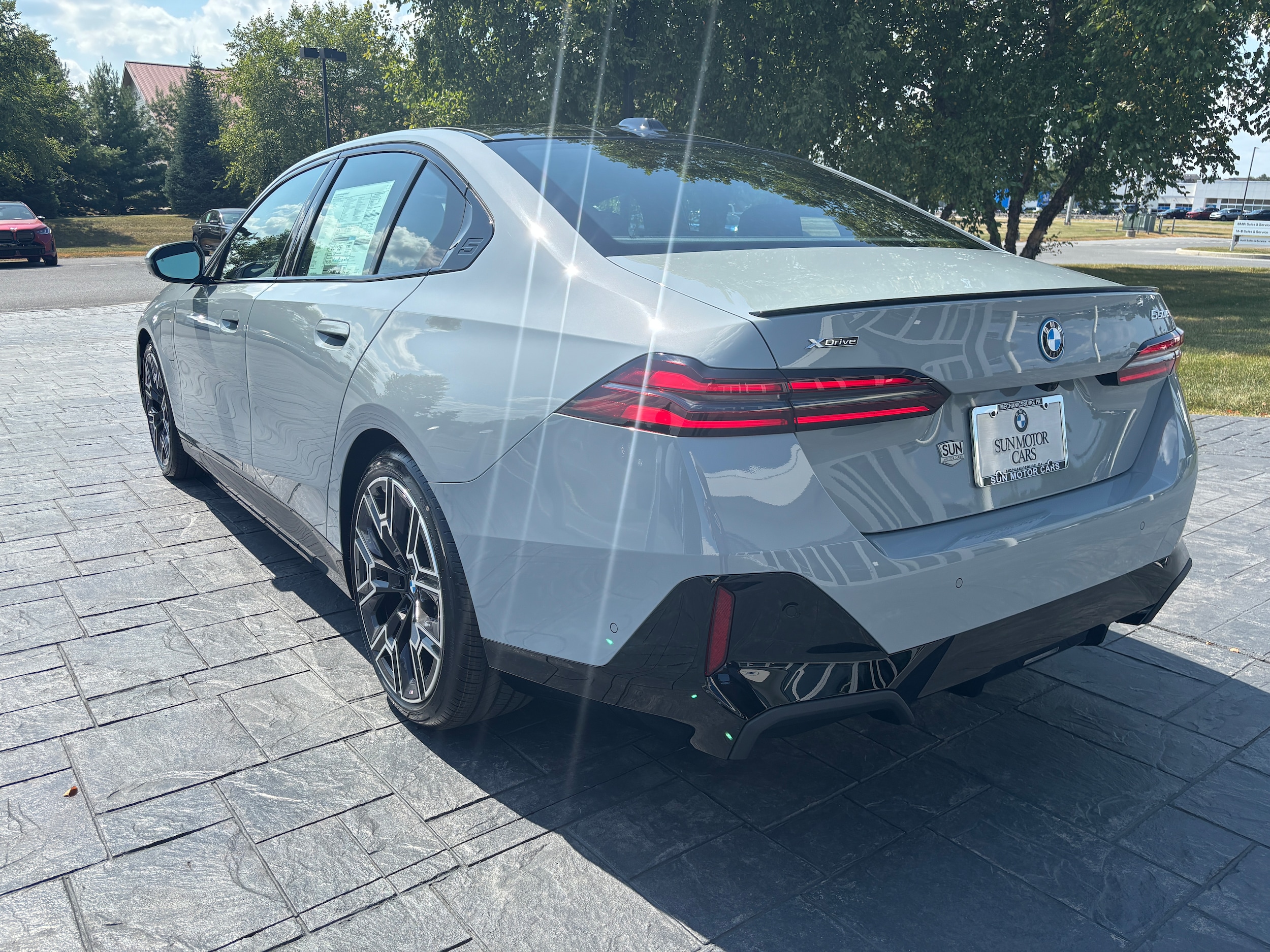 2026 BMW 5 Series 550e - Photo 7
