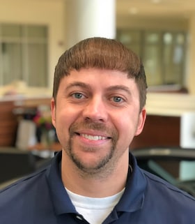 Staff member Adam Smith from e9ee12e9cc3d