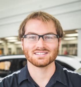 Staff member Logan Doll from ID_0d0928