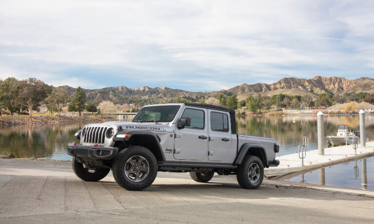 2021 Jeep Gladiator driving in sleek gray exterior