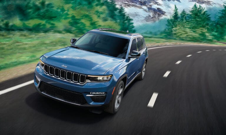 2023 Grand Cherokee driving fast through the state