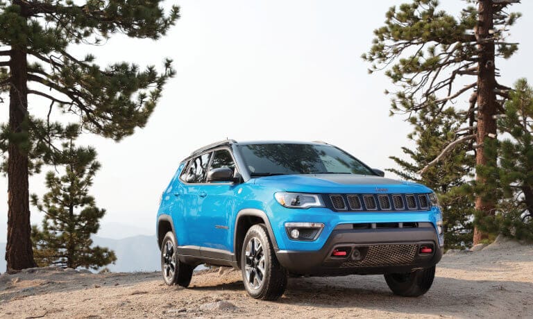 Jeep Compass parked on cliff