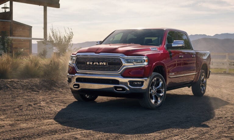 2022 Ram 1500 parked next to a ranch