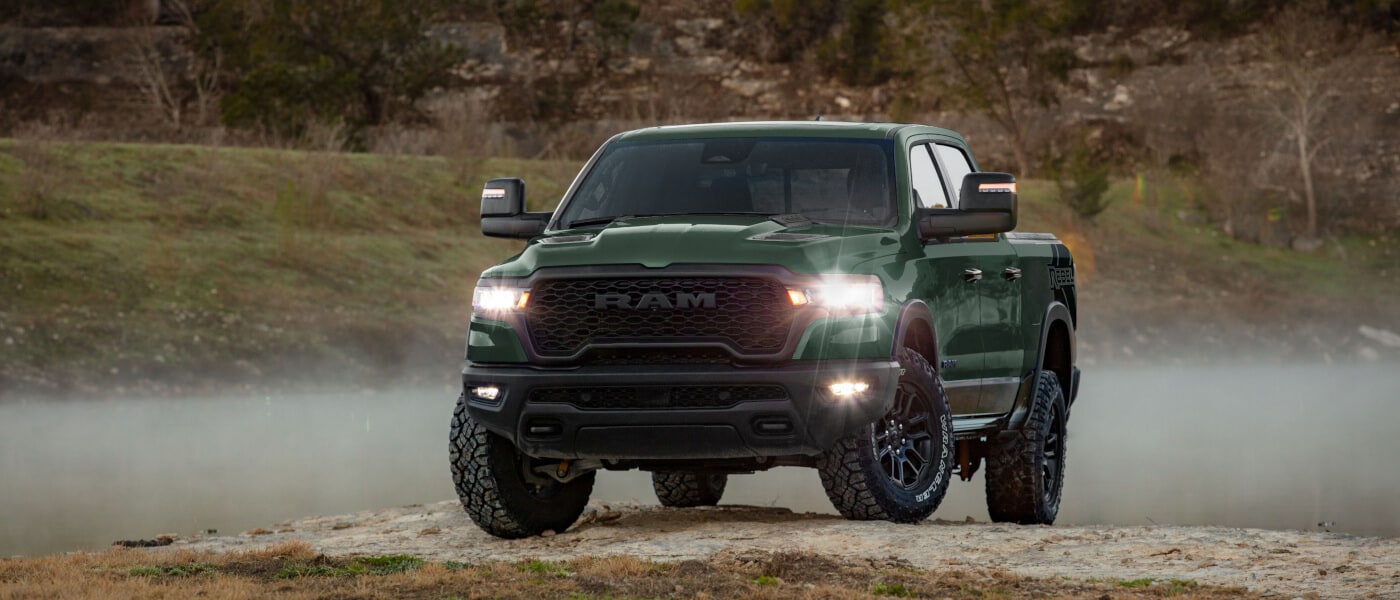 26Ram-1500-ExteriorParkedByFoggyStream