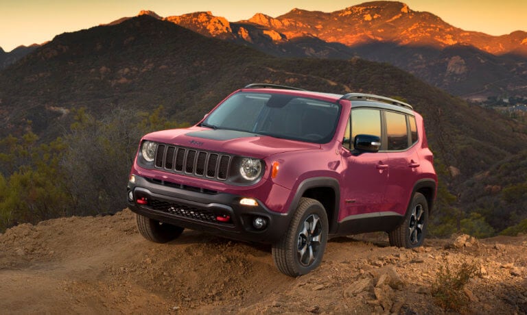 2023 Jeep Renegade driving by the sunset