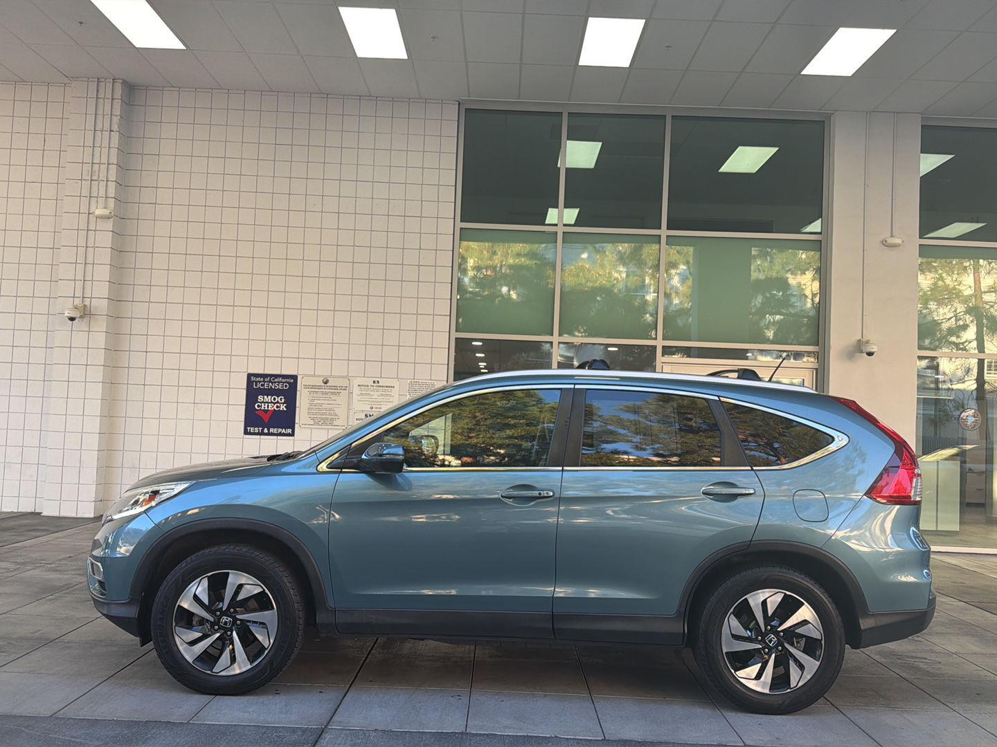 Used 2016 Honda CR-V Touring with VIN 5J6RM4H91GL100570 for sale in Sunnyvale, CA