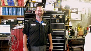 Staff member JOHN ZESIGER from 7745fbe62426