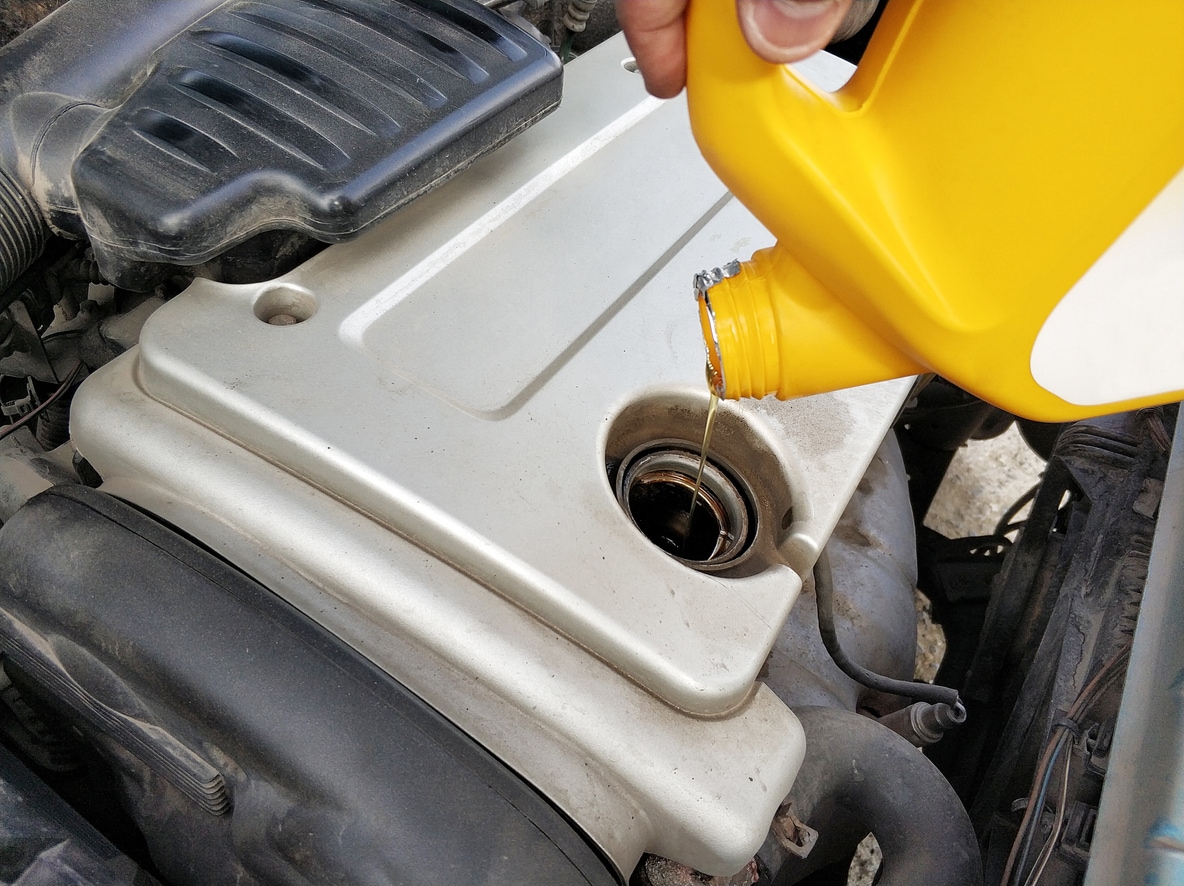 1694006852263-pouring-engine-oil.jpg