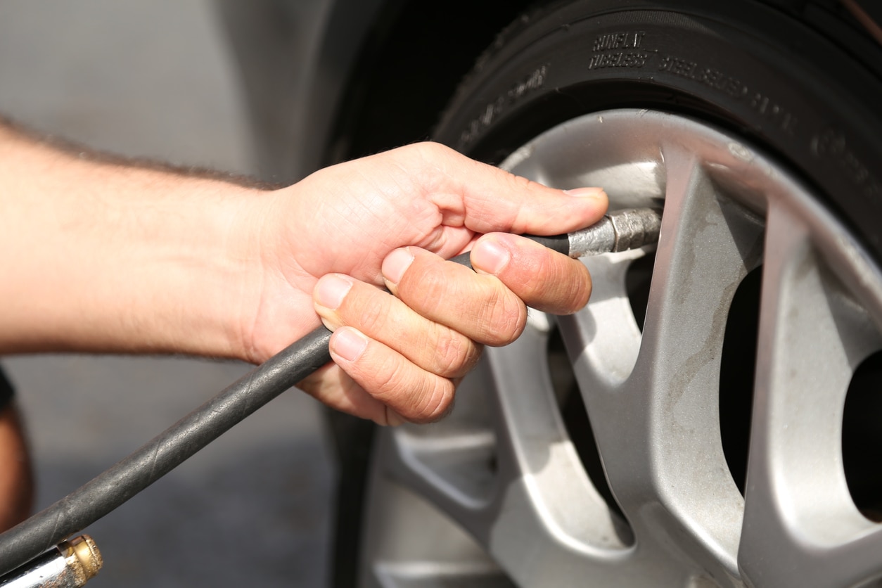 1697697458557-Filling the tire with air.jpg
