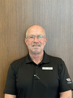 Staff member John Olten from 24eef82f5899