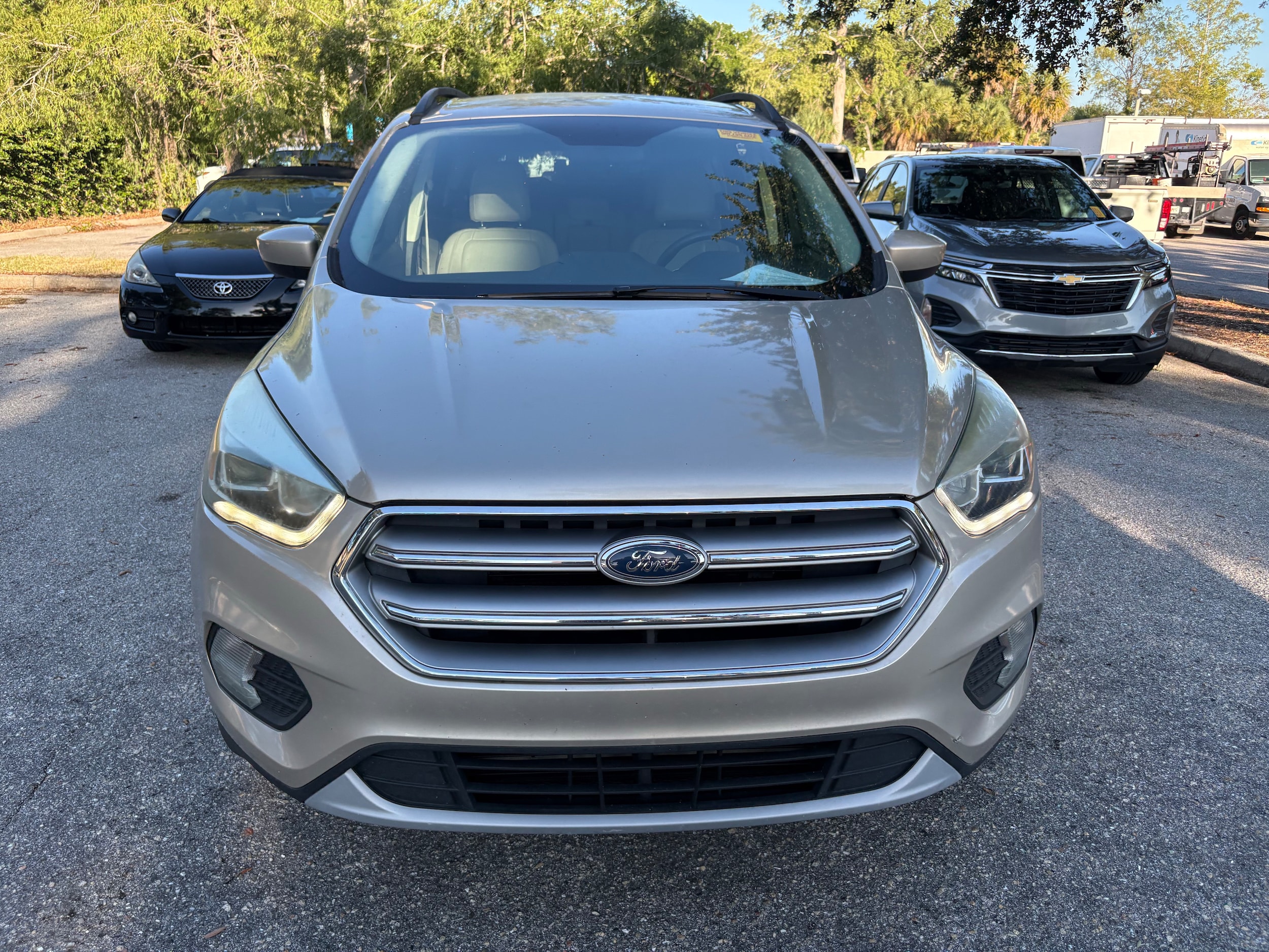 Used 2017 Ford Escape SE with VIN 1FMCU0G93HUB96358 for sale in Sarasota, FL