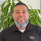 Staff member Lupe Orduno Jr. from 54adf4fdfe19