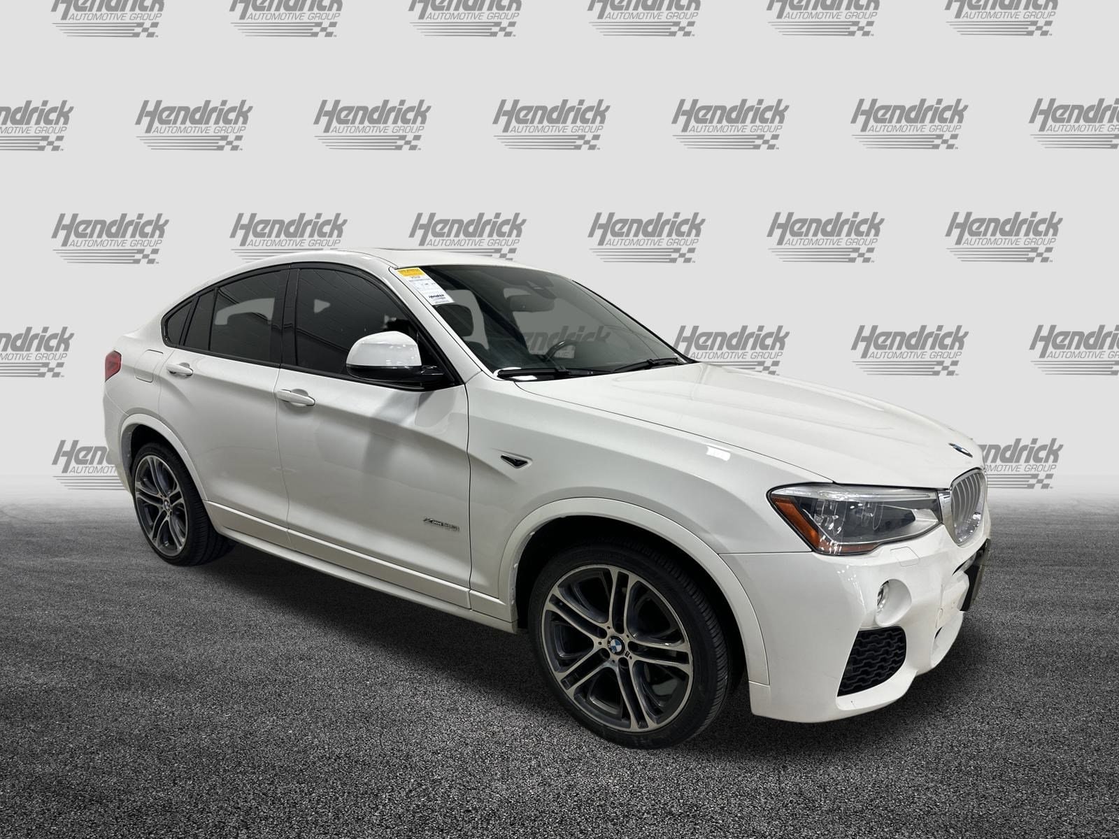 Used 2015 BMW X4 xDrive35i with VIN 5UXXW5C56F0E87636 for sale in Kansas City