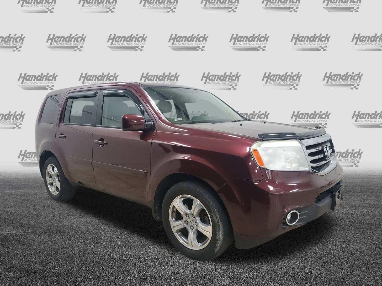 Used 2015 Honda Pilot EX-L with VIN 5FNYF4H51FB042129 for sale in Kansas City