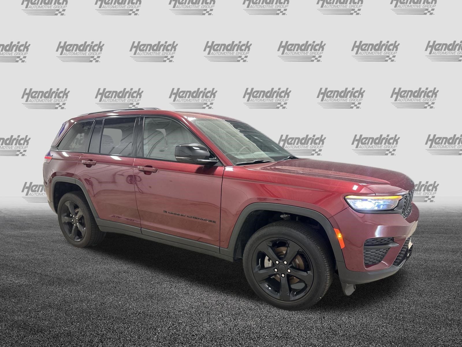 Used 2025 Jeep Grand Cherokee Altitude with VIN 1C4RJHAG1SC302204 for sale in Kansas City