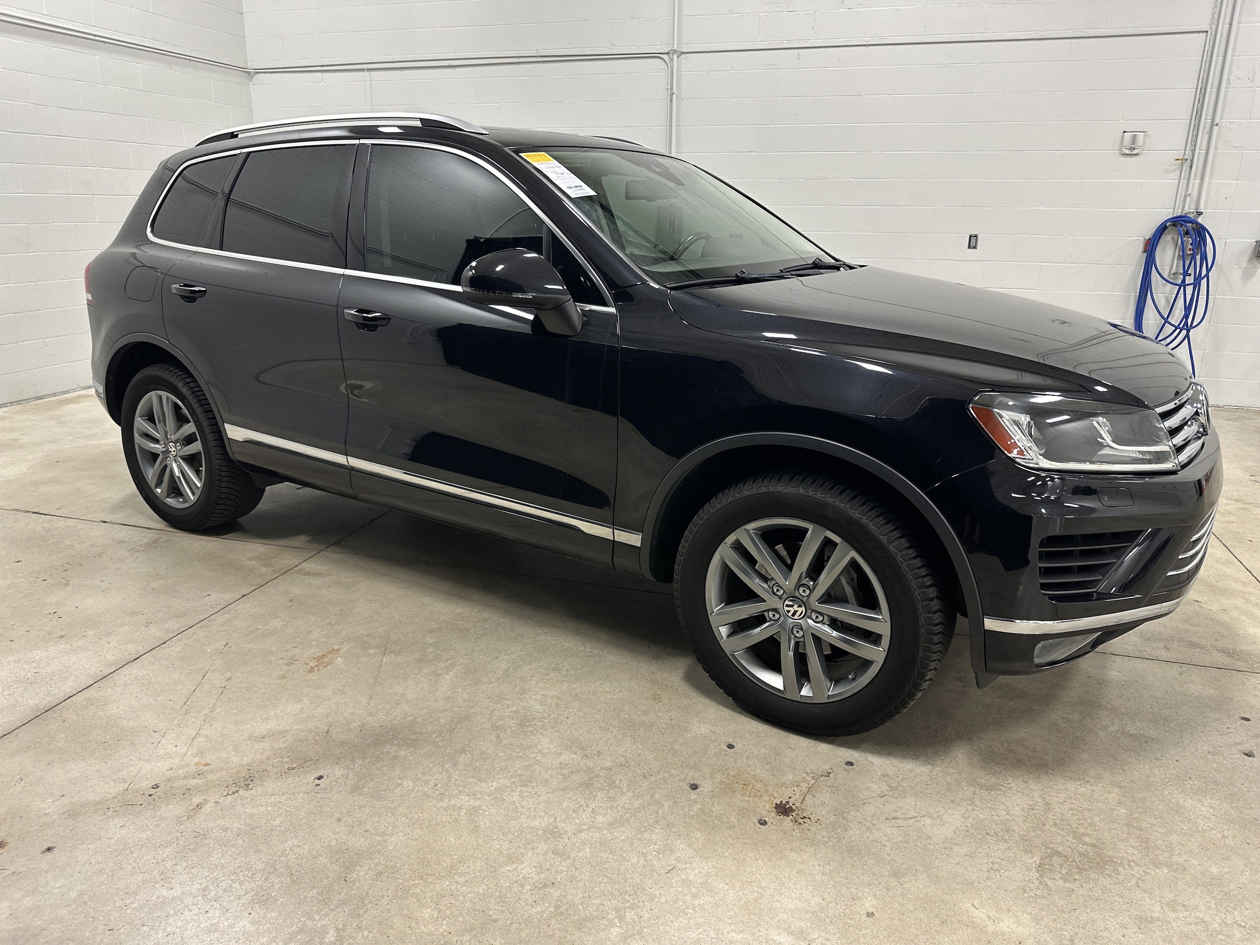 Used 2015 Volkswagen Touareg Sport with VIN WVGEF9BP1FD008236 for sale in Kansas City