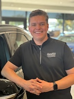 Staff member CHRIS WOOMER from ID_6fdd375fb786