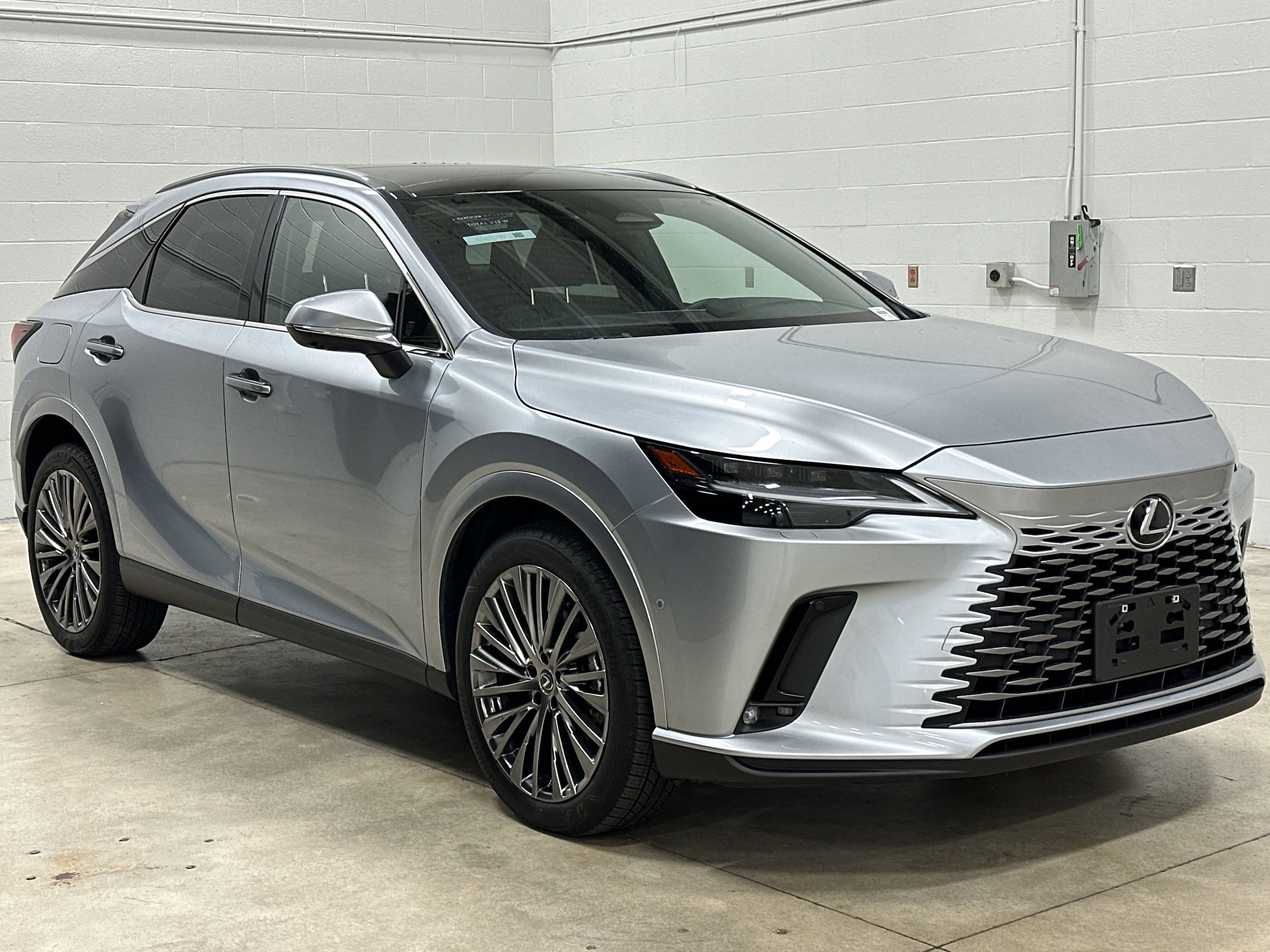 Used 2024 Lexus RX PHEV 450h+ with VIN JTJCJMGA9R2019631 for sale in Kansas City