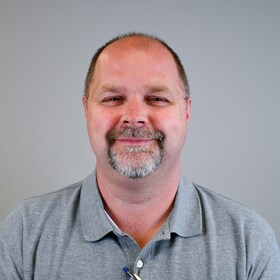 Staff member Dennis Cook from f7d3002dd6b0