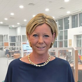 Staff member Melanie Thompson from 1a28b31c30c8
