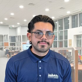 Staff member Eric Lopez from 080172b6b206