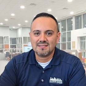 Staff member Carlos Rodriguez from 3c487a952e7a