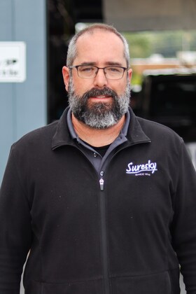 Staff member Chris Chiosie from 0a8c6623a4dc