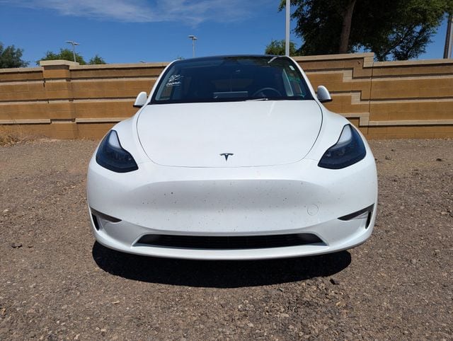 Used 2025 Tesla Model Y Long Range with VIN 7SAYGDED6SF259407 for sale in Surprise, AZ