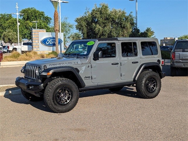 Used 2023 Jeep Wrangler 4-Door High Tide with VIN 1C4HJXDG4PW648142 for sale in Surprise, AZ