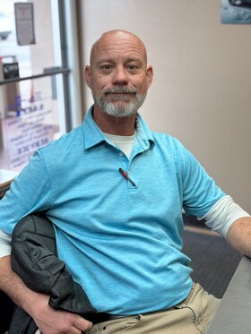 Staff member Ron Menesini from ID_726b41bfb977