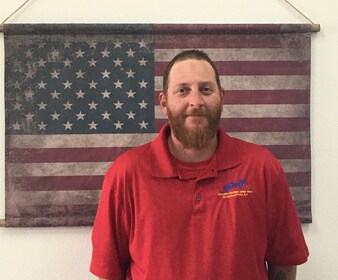 Staff member Andrew Houts from ID_83554e244b32