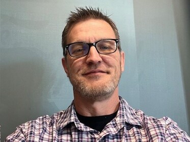 Staff member Keith Cunningham from 28ed9970ef32