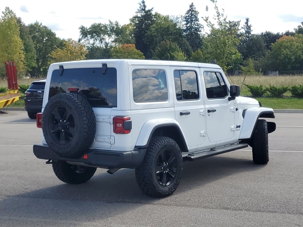 Used 2019 Jeep Wrangler Unlimited Sahara Altitude with VIN 1C4HJXEG7KW642679 for sale in New Hudson, MI