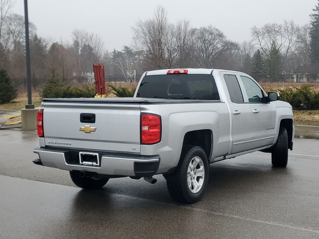 Used 2016 Chevrolet Silverado 1500 LT Z71 with VIN 1GCVKRECXGZ185977 for sale in New Hudson, MI