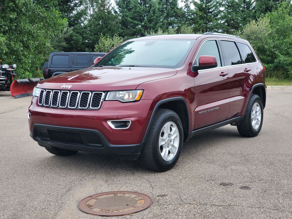 Used 2017 Jeep Grand Cherokee Laredo E with VIN 1C4RJFAG2HC739514 for sale in New Hudson, MI