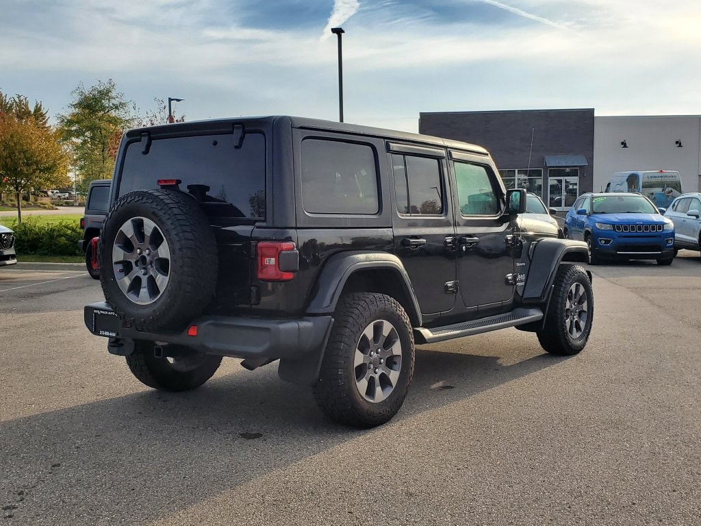 Used 2019 Jeep Wrangler Unlimited Sahara with VIN 1C4HJXEG7KW674418 for sale in New Hudson, MI