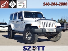 Used 2013 Jeep Wrangler Unlimited Sahara SUV For Sale in Highland, MI