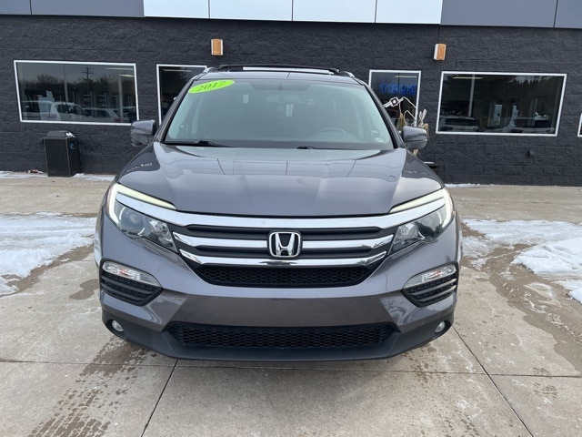 Used 2017 Honda Pilot EX-L with VIN 5FNYF6H54HB056301 for sale in White Lake charter Township, MI