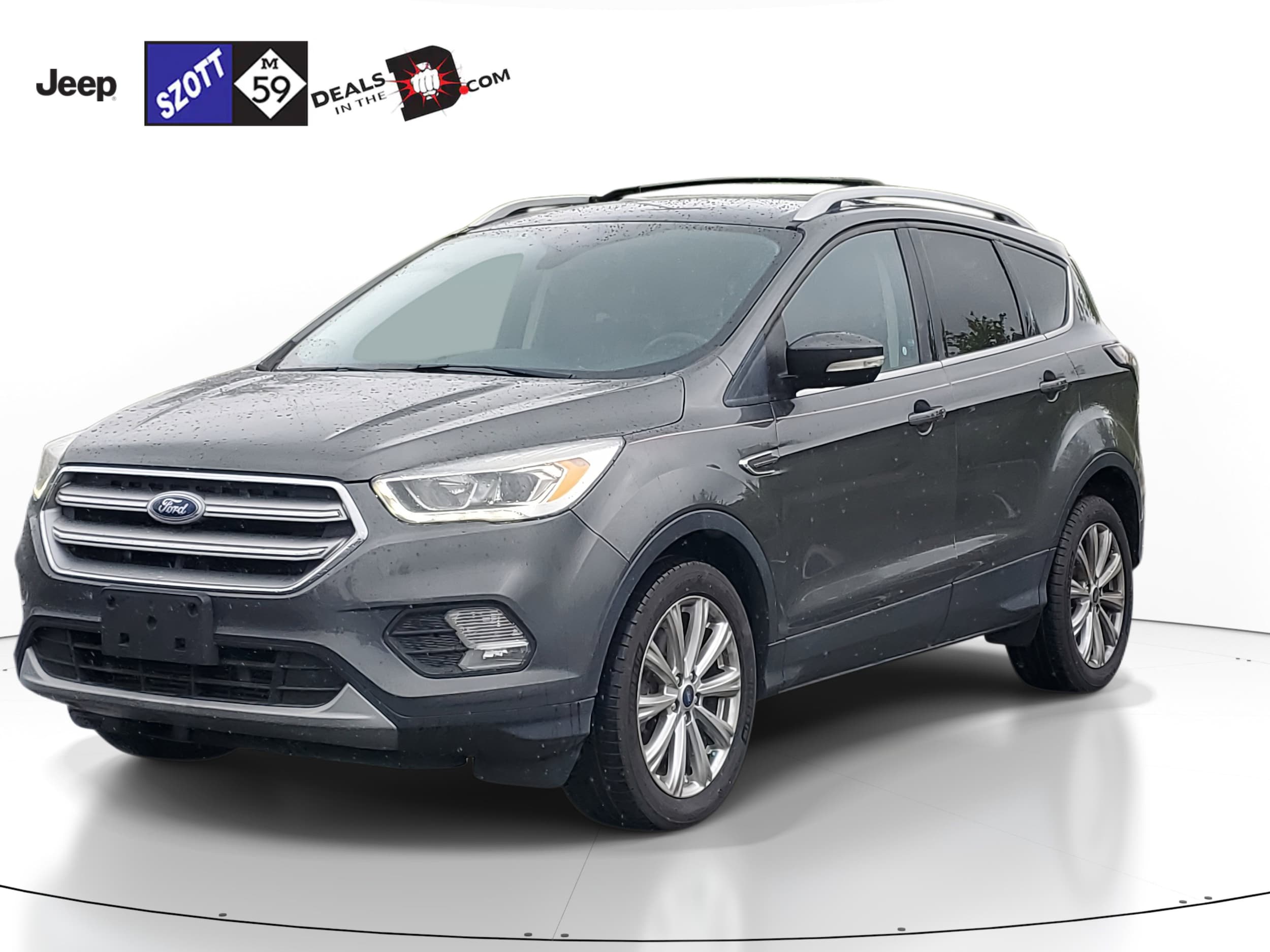 Used 2017 Ford Escape Titanium with VIN 1FMCU9J97HUA86796 for sale in White Lake, MI