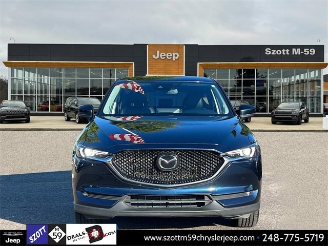 Used 2021 Mazda CX-5 Grand Touring with VIN JM3KFBDM1M0483530 for sale in White Lake, MI