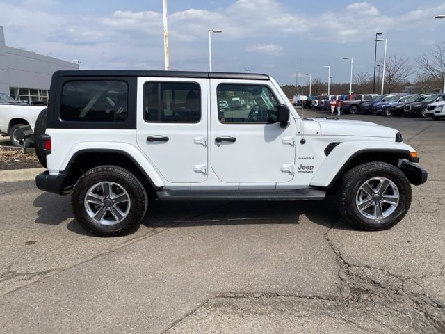 Used 2022 Jeep Wrangler Unlimited Sahara with VIN 1C4HJXEN5NW151093 for sale in Highland, MI