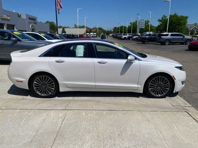 Used 2015 Lincoln MKZ Base with VIN 3LN6L2JK8FR600699 for sale in Highland Charter Township, MI