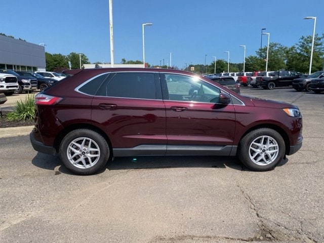 Used 2023 Ford Edge SEL with VIN 2FMPK4J90PBA01599 for sale in Highland, MI