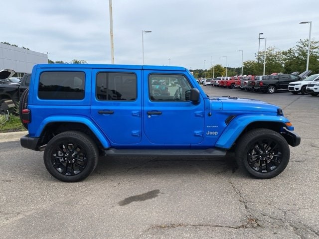 Used 2021 Jeep Wrangler Unlimited Sahara 4XE with VIN 1C4JJXP62MW810138 for sale in Highland, MI