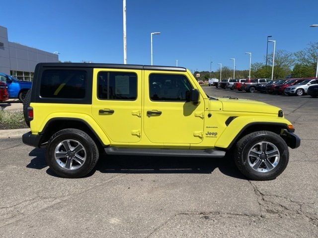 Used 2023 Jeep Wrangler 4-Door Sahara with VIN 1C4HJXEG2PW595407 for sale in Highland, MI