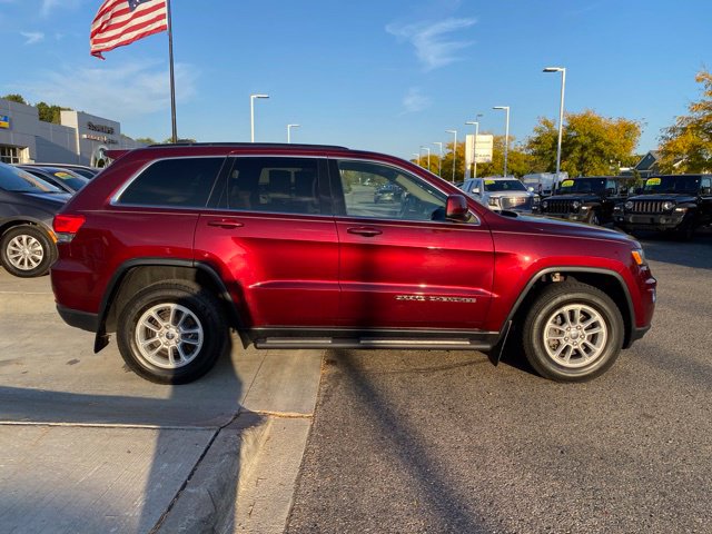 Used 2019 Jeep Grand Cherokee Laredo with VIN 1C4RJFAG1KC660312 for sale in Highland Charter Township, MI