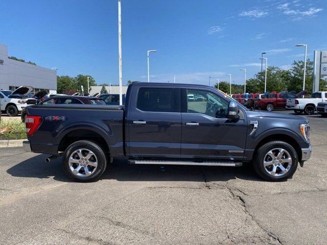 Used 2022 Ford F-150 Lariat with VIN 1FTFW1ED9NFA09195 for sale in Highland, MI