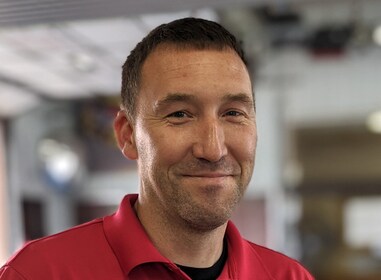 Staff member Adam Booms from ID_cf15ec700538