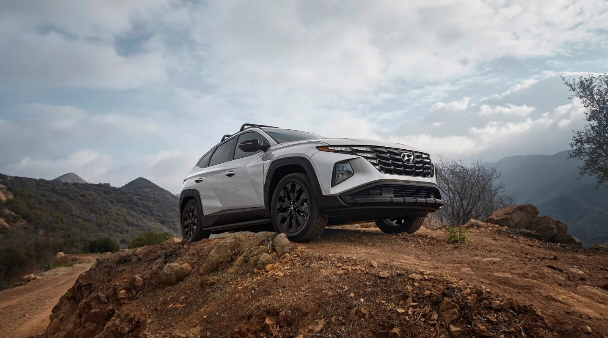 The 2024 Hyundai Tucson atop an elevated dirt road